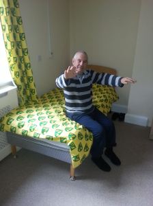 My dad in his room in his care home, a Canary from beginning to end.